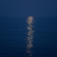 Buy canvas prints of Full moon and moonlight on an indigo sea by Gordon Dixon