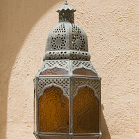 Buy canvas prints of Arabian styled exterior lamp in arched alcove, Dubai by Gordon Dixon
