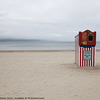 Buy canvas prints of Punch and Judy booth on a deserted Weymouth beach by Gordon Dixon