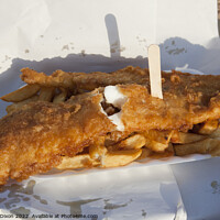 Buy canvas prints of Golden brown battered fish with chips and a wooden fork in paper - delicious by Gordon Dixon