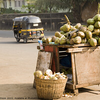 Buy canvas prints of Fresh coconuts for sale on the roadside at Mumbai, India by Gordon Dixon