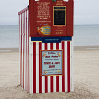 Buy canvas prints of Punch and Judy booth on Weymouth beach - traditional children's entertainment by Gordon Dixon