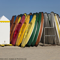 Buy canvas prints of Colourful sit-on kayaks for hire on Weymouth beach by Gordon Dixon