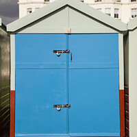 Buy canvas prints of Blue coloured beach hut on the esplanade, Brighton and Hove by Gordon Dixon