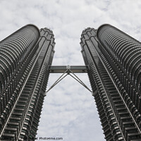Buy canvas prints of Looking up at the Petronas twin towers, Kuala Lumpur, Malaysia by Gordon Dixon