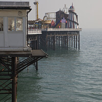 Buy canvas prints of Brighton pier amusements - funfair over the sea by Gordon Dixon