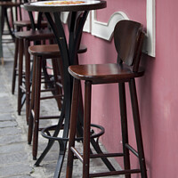 Buy canvas prints of Seating outside a pink walled café' - Curitiba, Brazil by Gordon Dixon