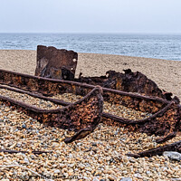 Buy canvas prints of Rusting hull on Chesil beach - Dorset by Gordon Dixon