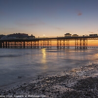 Buy canvas prints of Cromer Pier sunrise by andrew loveday