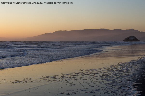 A sunset over a beach, Pacific ocean Picture Board by Eszter Imrene Virt