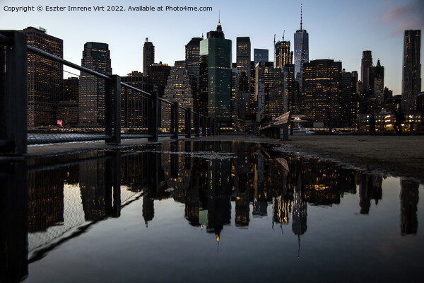 Reflection of the skyline of Manhattan at night Picture Board by Eszter Imrene Virt
