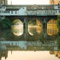 Buy canvas prints of Backside of the Pulteney Bridge in a misty morning by Rowena Ko
