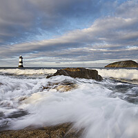 Buy canvas prints of Trwyn Du Lighthouse and Puffin Island by Dave Urwin