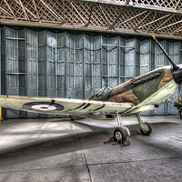 Buy canvas prints of Supermarine Spitfire at IWM Duxford  by Dave Urwin