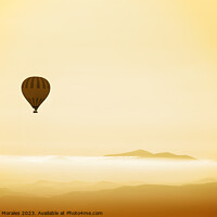 Buy canvas prints of Hot air balloon over mountains in dawn mist by Catalina Morales