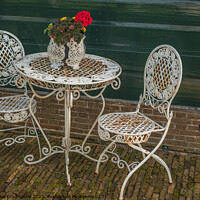 Buy canvas prints of Old table and chairs in Zaanse Schans by Veronika Druzhnieva