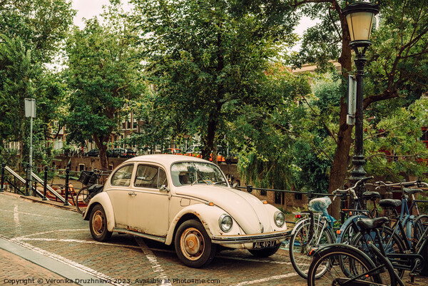 Old car on the street of old Utrecht.  Picture Board by Veronika Druzhnieva