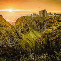Buy canvas prints of Sunrise at Dunnottar Castle in Stonehaven Scotland by DAVID FRANCIS