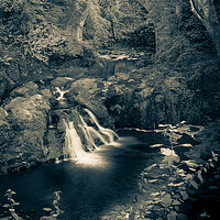 Buy canvas prints of Peaceful Arbirlot Waterfall in Scotland Monochrome by DAVID FRANCIS