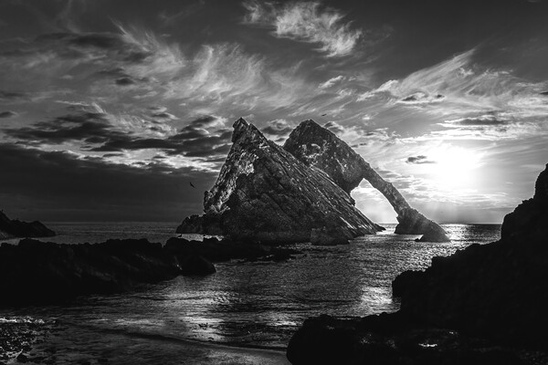 Sunrise at Bow Fiddle Rock in Black and White  Picture Board by DAVID FRANCIS