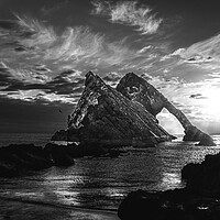 Buy canvas prints of Sunrise at Bow Fiddle Rock in Black and White  by DAVID FRANCIS