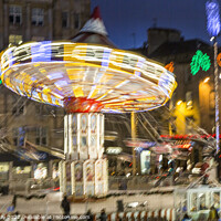 Buy canvas prints of Chair-o-planes at the Christmas funfair George Square Glasgow Scotland UK by Rose Sicily