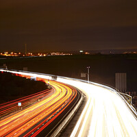 Buy canvas prints of Motorway Traffic Light Trails by Drew Gardner