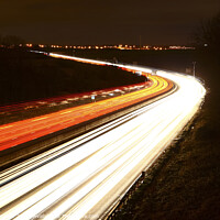 Buy canvas prints of Motorway Traffic Light Trails by Drew Gardner