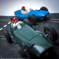 Buy canvas prints of Two toy race cars by Bernard Jaubert
