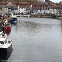 Buy canvas prints of Weymouth Harbour's Tranquil Docked Boat by Carnegie 42