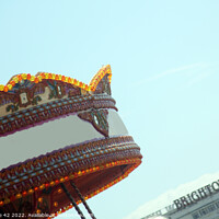Buy canvas prints of Brighton Pier's Allure: A Carousel in Sunlight by Carnegie 42