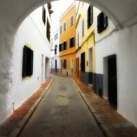 Buy canvas prints of Menorca Backstreet Ciutadella. by Craig Yates