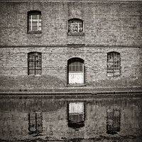 Buy canvas prints of Canal Building Reflection Sepia by Craig Yates