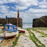 Buy canvas prints of Mousehole Harbour Entrance Cornwall. by Craig Yates