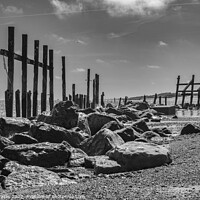 Buy canvas prints of Happisburgh wooden sea defences black and white. by Craig Yates