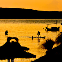 Buy canvas prints of Sunset Paddle Boarder Menorca Spain. by Craig Yates