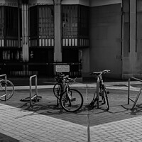 Buy canvas prints of Row of bikes in the street. by Kelly Burton