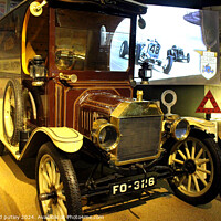 Buy canvas prints of 1914 Ford Model T Van car at Beaulieu Car Museum. by Ray Putley