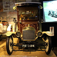 Buy canvas prints of 1914 Ford Model T Van at Beaulieu Car Museum. by Ray Putley