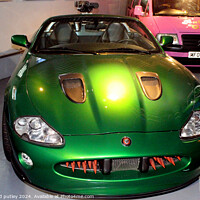 Buy canvas prints of 2002 Jaguar XKR Convertible James Bond Car by Ray Putley