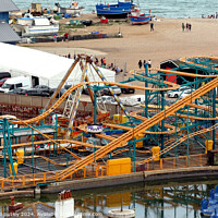 Buy canvas prints of Hastings Seafront - Amusements  by Ray Putley