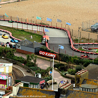 Buy canvas prints of Hastings Seafront - Amusements  by Ray Putley