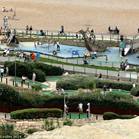 Buy canvas prints of Hastings Seafront - Amusements by Ray Putley