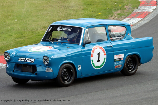 Blue Ford Anglia Racing Picture Board by Ray Putley