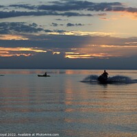 Buy canvas prints of Selection of water-sports at sunset! by Rachel Royal