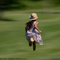 Buy canvas prints of Child in vintage dress and hat running on grass by TheOther Kev
