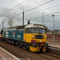Buy canvas prints of Preserved Vintage Diesel Train Passes Through Scot by Rodney Hutchinson