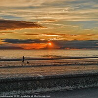 Buy canvas prints of A sunset from a beach by Rodney Hutchinson