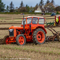 Buy canvas prints of Vintage Tractor Ploughing by Rodney Hutchinson
