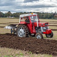 Buy canvas prints of Tractor Ploughing by Rodney Hutchinson